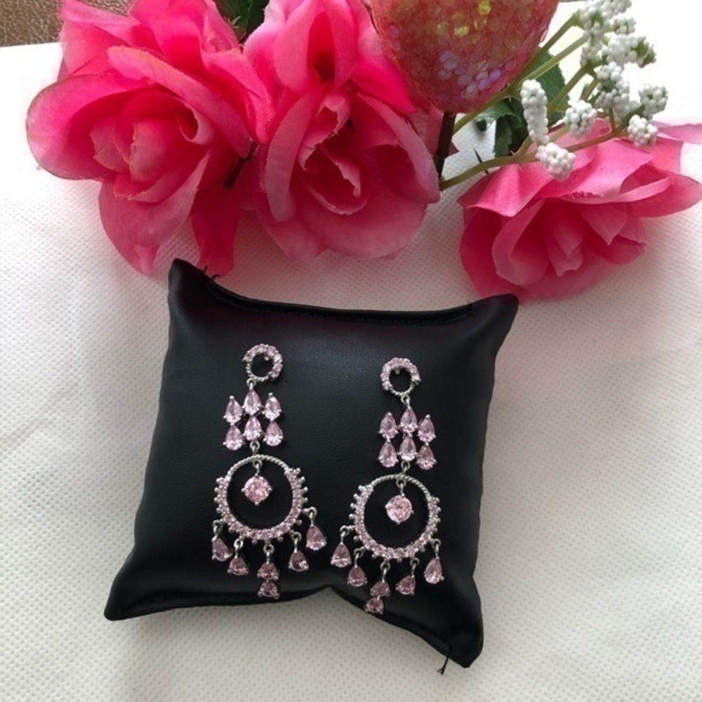 Pink  crystal earrings pierced.